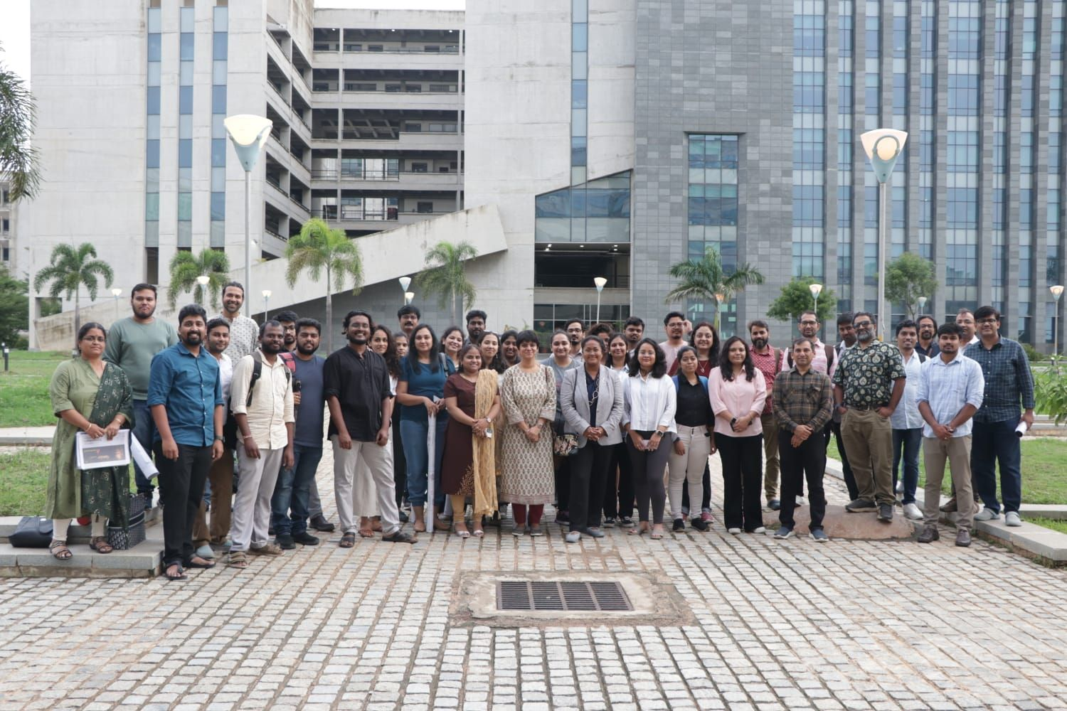 Cohort group photo in front of IIT Hyderabad buildings